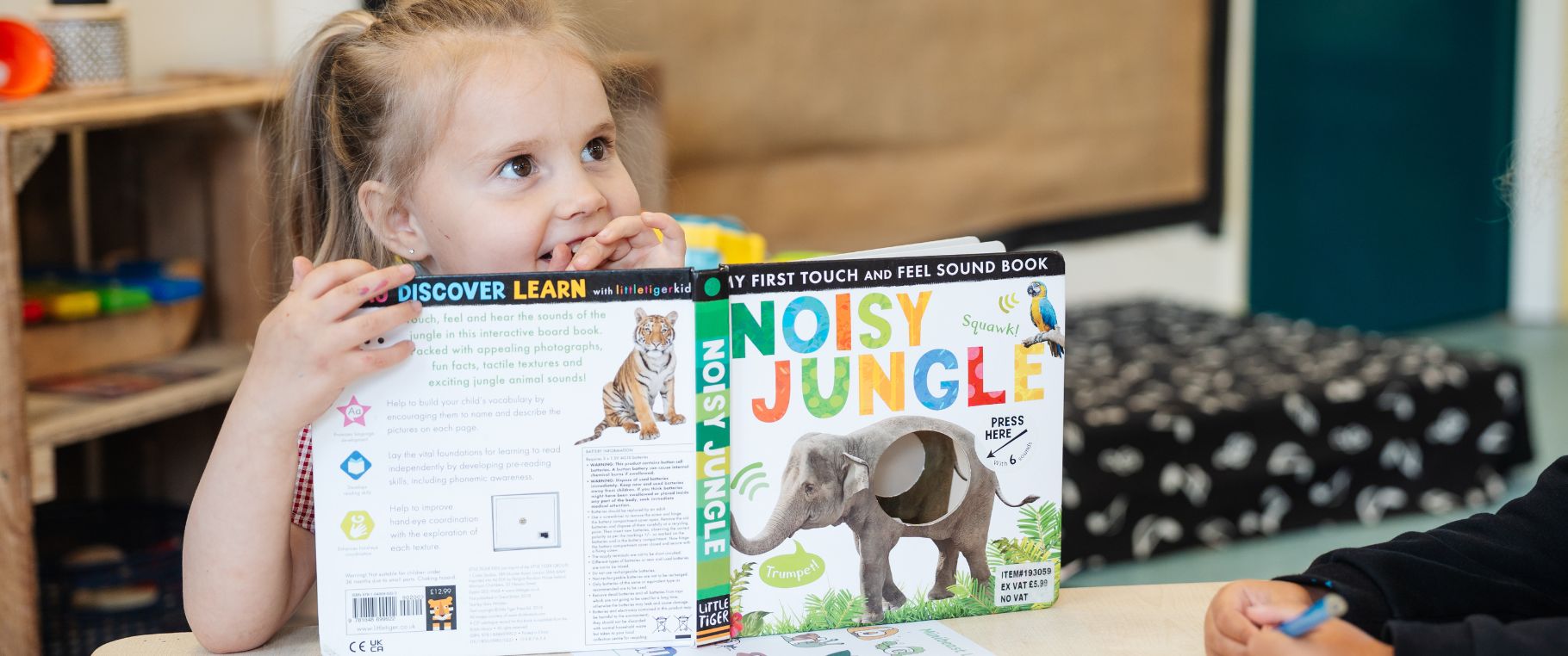 Header image showing children in classroom