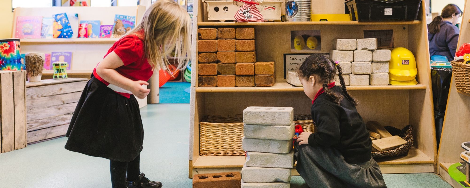 Header image showing children in classroom